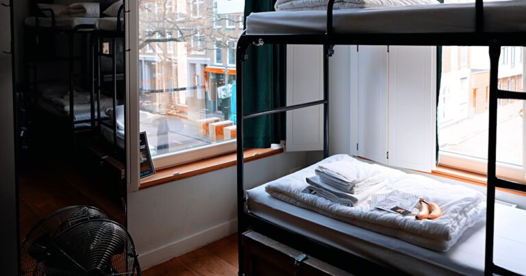 A metal bunk bed in a room